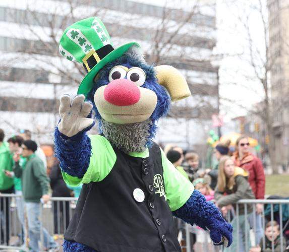 A green halfmile WilkesBarre St. Patrick's Day Parade features music