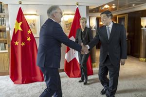 US-China tariff talks to continue Sunday, an official tells AP, as Trump touts 'great progress made'