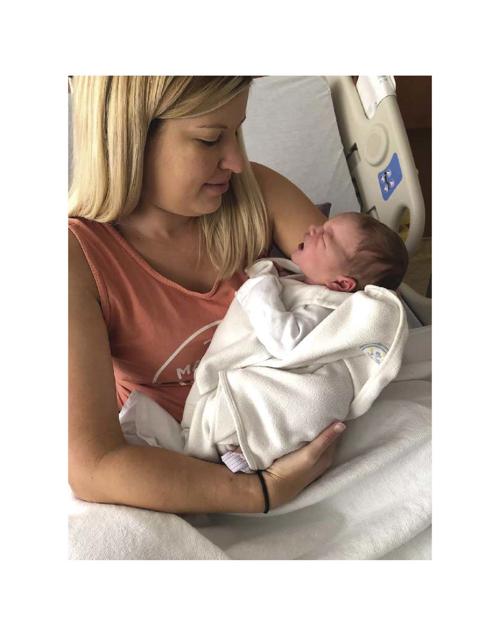 Above & Beyond: Tow truck driver helps customer in labor
