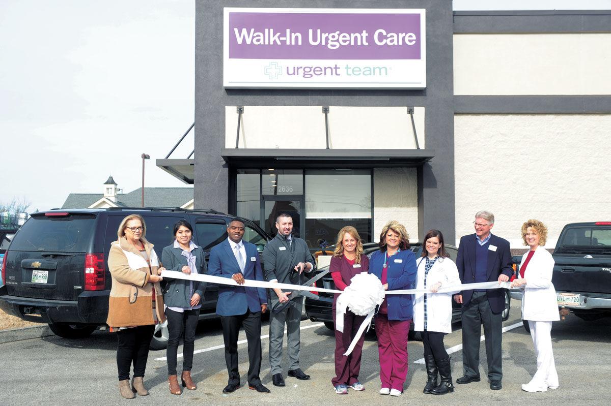 Chamber host ribbon cutting for health care facility