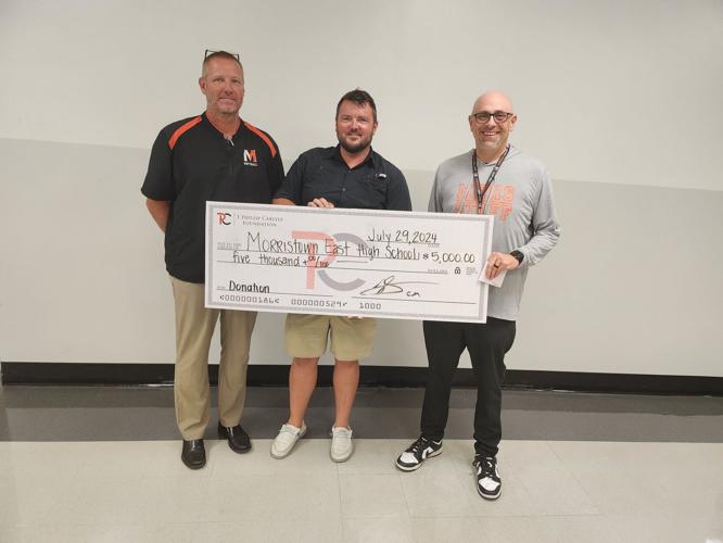 East athletics presented money