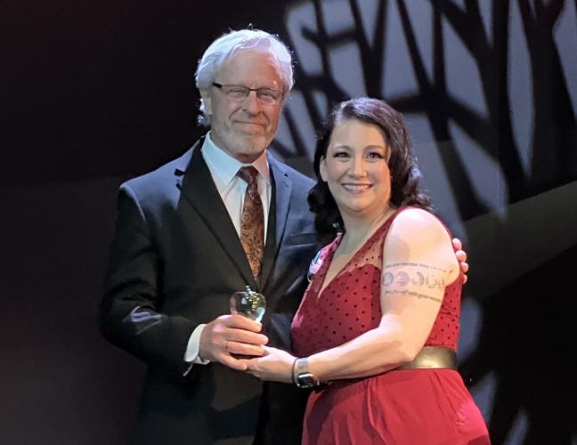 From left: Don Knight, named ‘Advocate of the Year’ at the Good Apple Awards in Oklahoma City, with Colleen McCarty, founding executive director for the Oklahoma Appleseed Center for Law and Justice.  Photograph by Darla Shelden