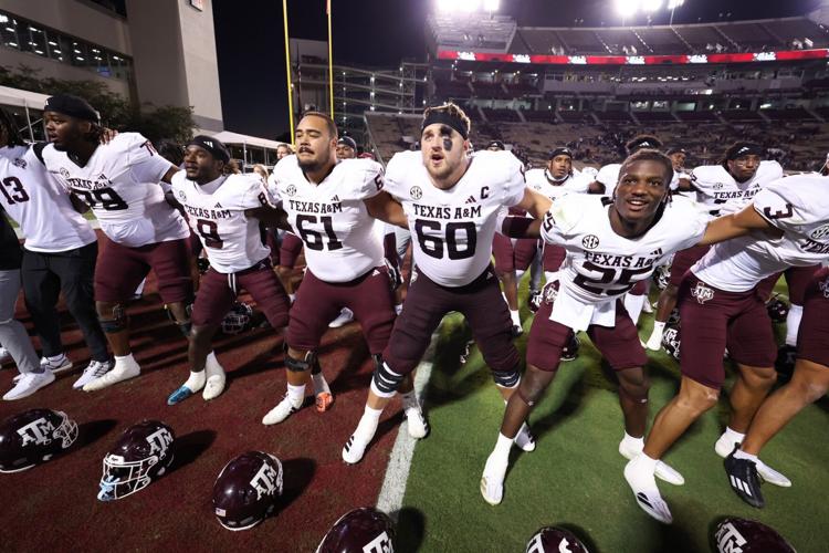 Texas A&M Aggies football team celebrating comeback victory