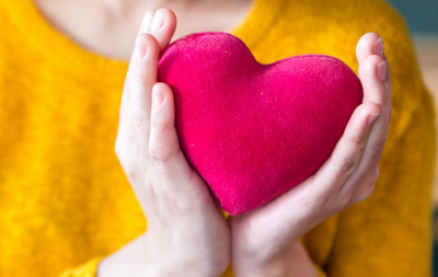 Hands holding heart