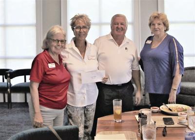 1. From left Barb Dasi, Treasurer for Christmas Island Style.tif