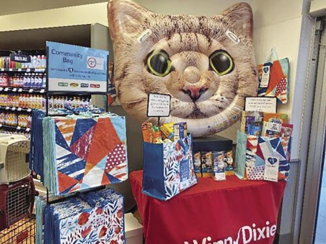 Winn Dixie Selects For the Love of Cats for Community Bag Program