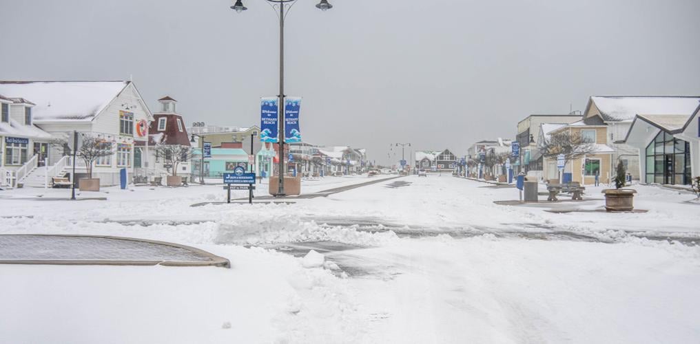 Snowy seascape showcases seasonal seaside splendor