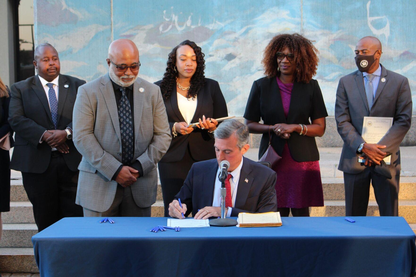 Carney signs criminal justice reform bills into law