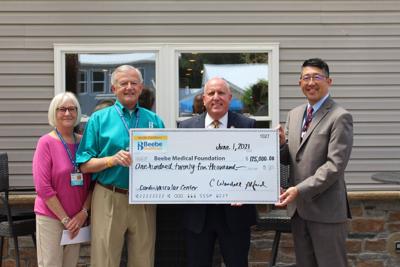 Beebe Auxiliary presents donation to Beebe officials