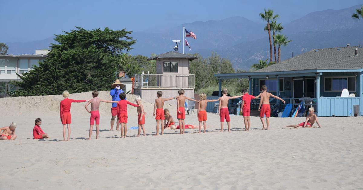 Junior Guards dominate beach for annual triathlon