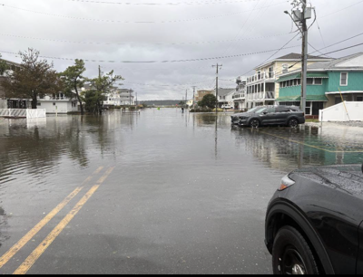 An image of a flooded road in Dewey Beach