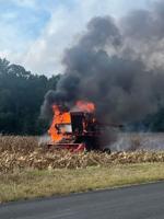 Tractor catches fire, blaze spreads to field