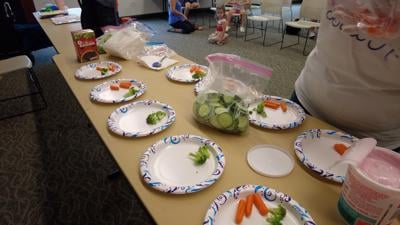 Vegetables being prepared for kids at the Kids In The Kitchen event at the Milton Public Library