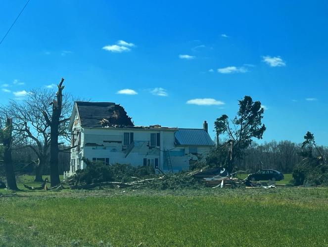 A house in Bridgeville Sunday morning with most of its roof blown off.