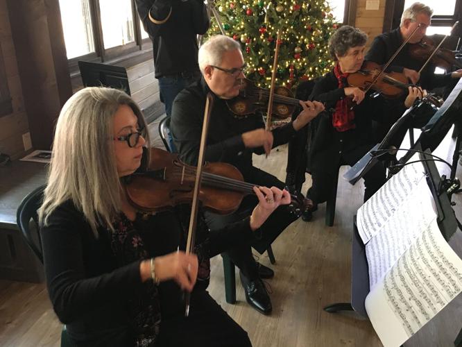 Violinists Melinda Verde, Jeff Indrisano, Michelle Peters, and Steve Greifer.