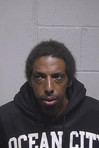 Mug shot of a man wearing an Ocean City hoodie.