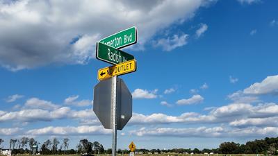 Radish road, road sign in the sun.