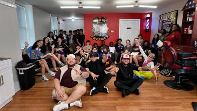 Students at Flow Factory Barbershop.