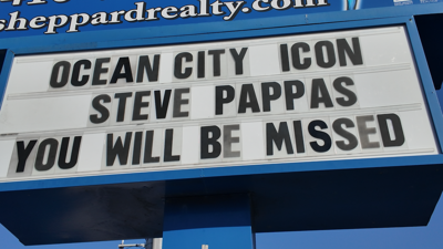 A sign reading " Ocean City Icon Steve Pappas you will be missed"