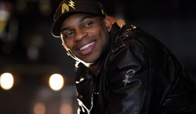 Jimmie Allen smiling