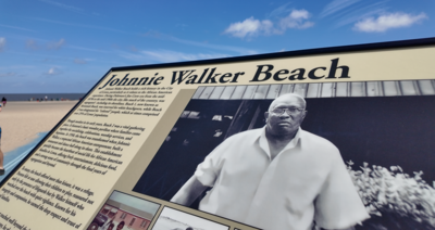 A plaque showing the impact Johnnie Walker had on the Lewes community. 