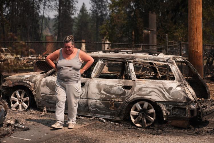 Photos show destruction from wildfires in Greece as blazes take hold in Europe and parts of the US