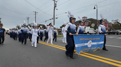 Cape Henlopen High School Marching Band in a parade.