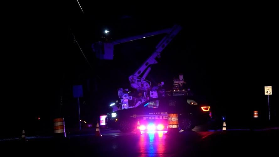 Crews working on pole