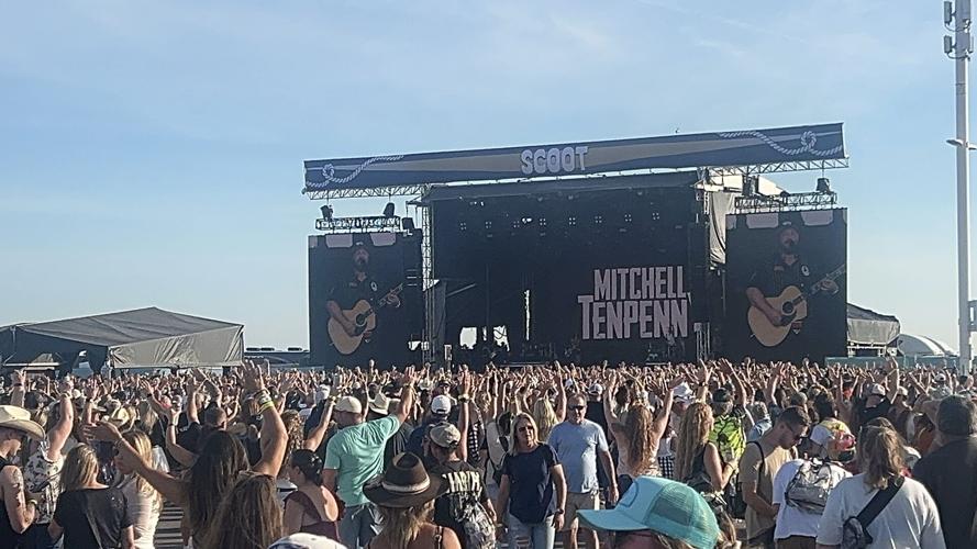 A large crowd gathers a the Scoot Stage.