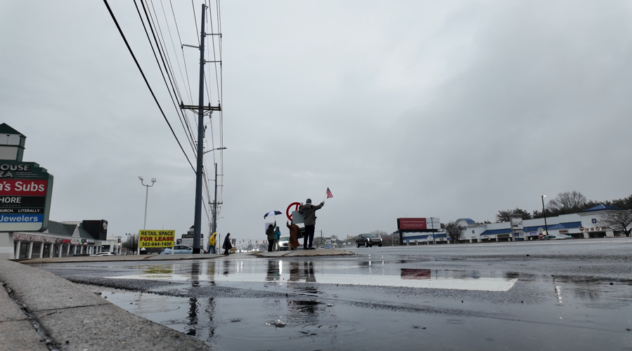 Protesters line Route 1