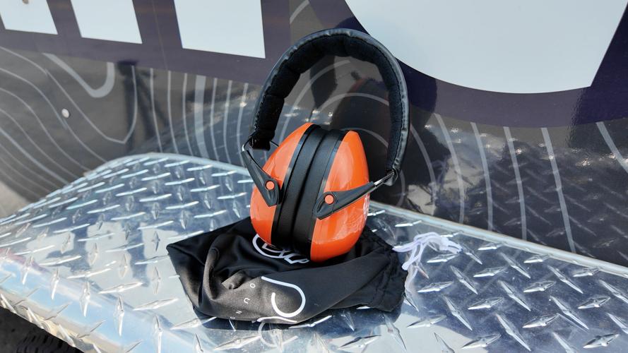 Noise cancelling headphones in KultureCity sensory bag at Delaware State Fair