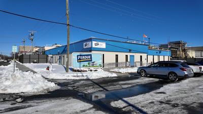 The employee described encountering a strong smell when passing through another area of the plant.
