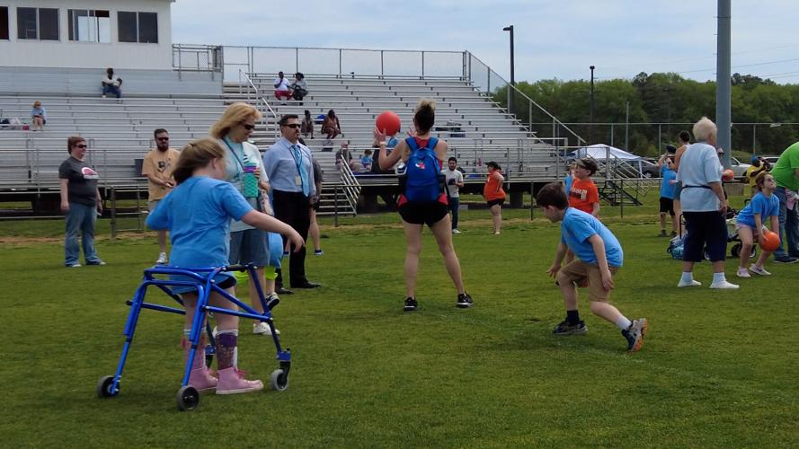 Volunteers support Special Olympics Delaware athletes at Sussex Tech
