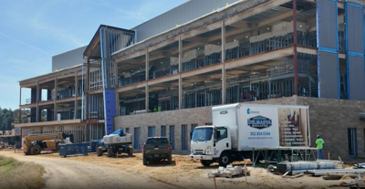 An exterior shot of the construction of the healthcare facility.