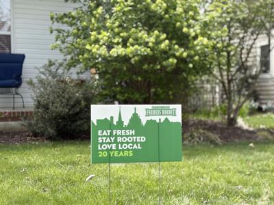 Eat Fresh, Stay Rooted, Love Local sign