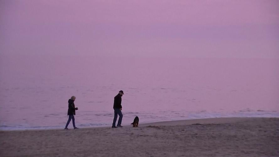 Bidens walk the beach