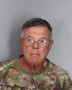 A headshot of Moorhead in a camo shirt.
