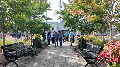 People walking with white canes