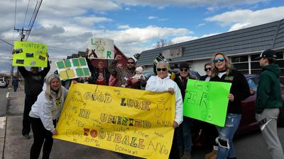 Supporters lined Main Street in Dagsboro, cheering the team on as they passed by.