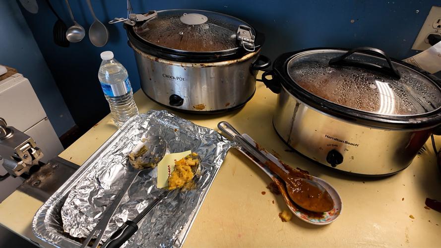 Warm meals for the homeless in crock pots at Higher Ground Outreach