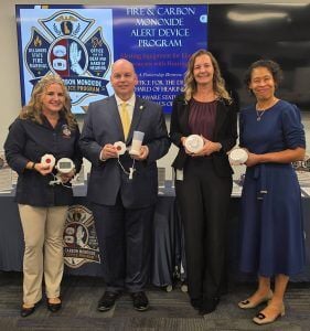 From left to right: Rebekah LePore, DSFMO; State Fire Marshal, John Rudd; Christina Feil, DODHH; & Elisha Jenkins, Vocational Rehab Division Director