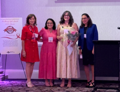 Heather Rowe (in yellow pictured second from right) at the Delaware Breast Cancer Coalition’s 2026 Shining Light Awards.