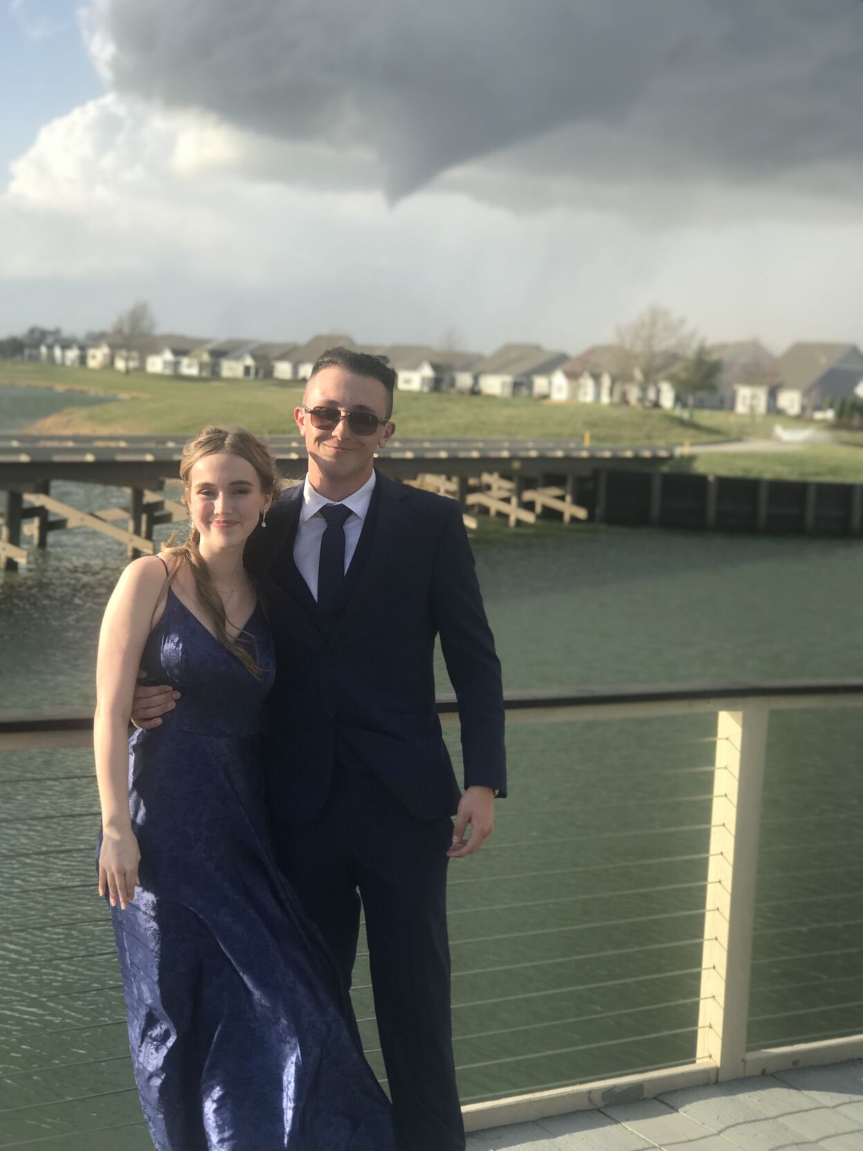Students Zoey Turner and Phillip Trice expected the water as their backdrop. Instead, they received once-in-a-lifetime photos of a tornado about to touchdown. Courtesy Emily McLaughlin.