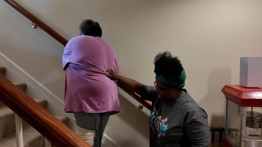 A Millsboro woman who fell victim to an employment scam helping her mother walk up the stairs