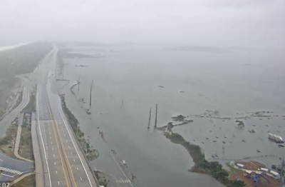Indian river inlet flooding on roads.