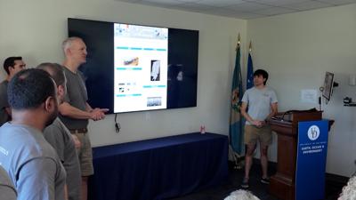 Industry representatives talking to students.