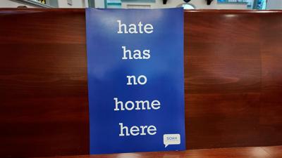 Hate has no home here sign