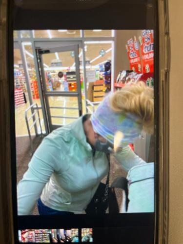Troopers are seeking the public's assistance in identifying the woman who they say stole personal care items from Safeway and pepper sprayed an employee Sunday night. Courtesy of Delaware State Police.