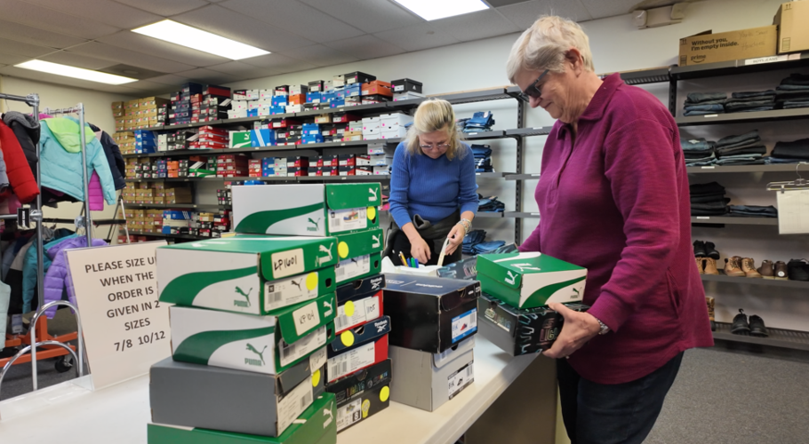 The new shoes were unpacked and organized by size for girls and boys.