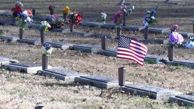 Volunteers Help "Wreaths Across America" Cleanup Wreaths and Graves